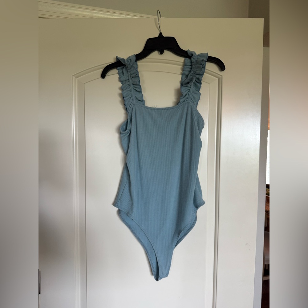 Elegant Blue Ruffled Bodysuit